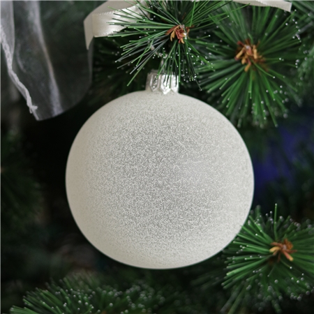 Glass ornament with snow effect