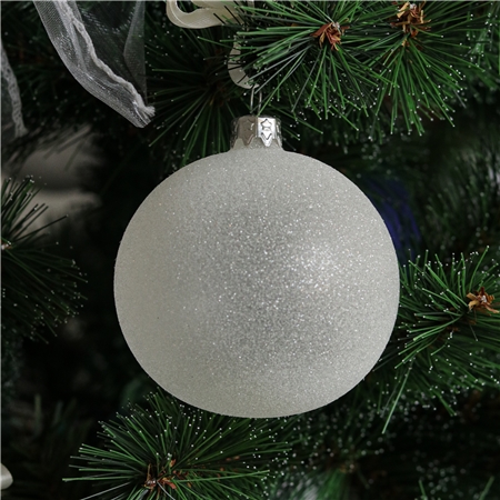 Glass christmas ball with white sprinkles