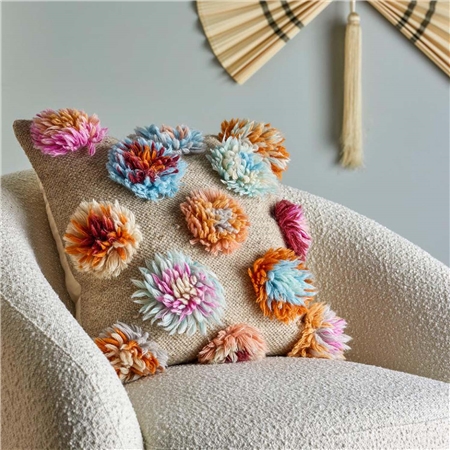 Pillow with woolen flowers