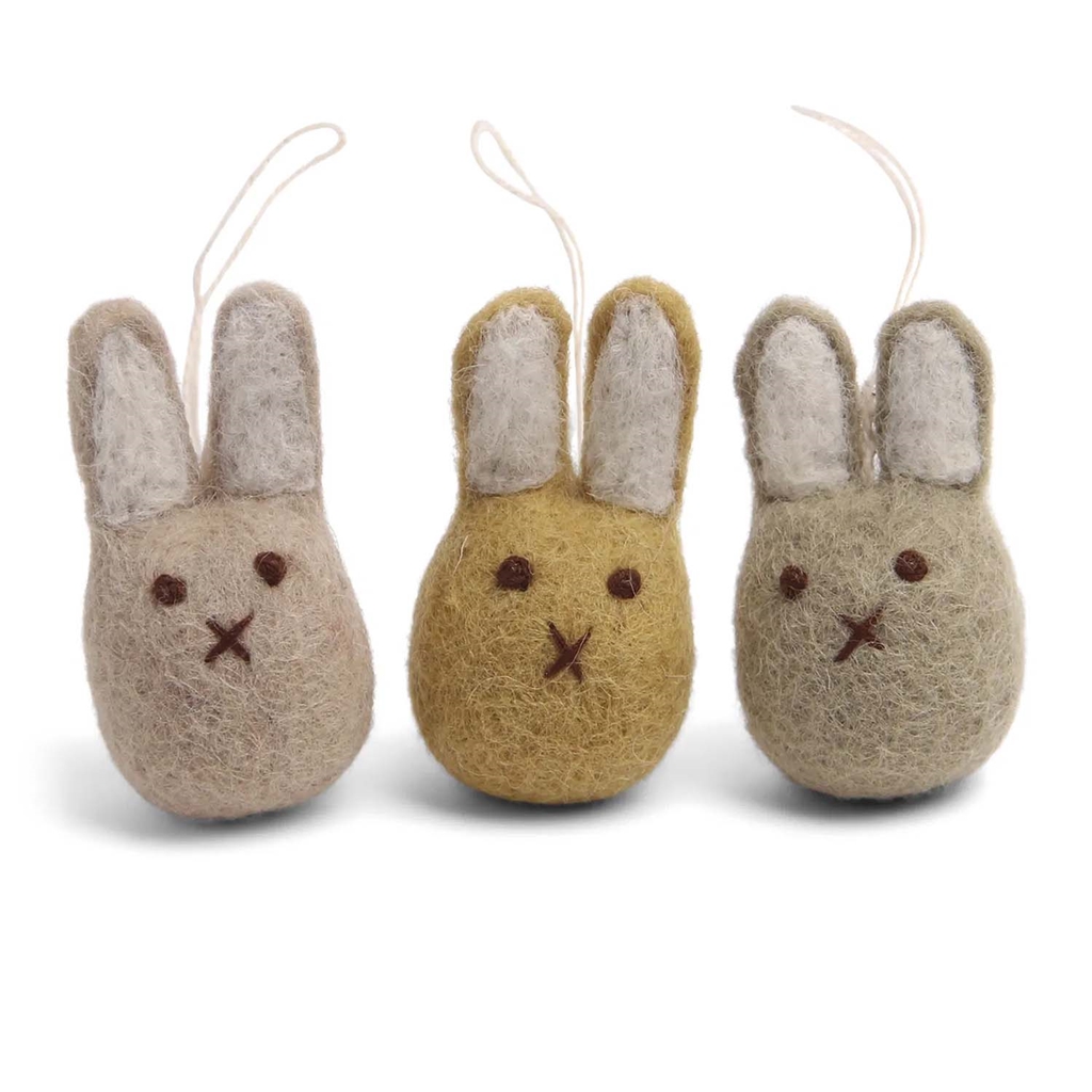 Set of felt rabbits in ochre colours