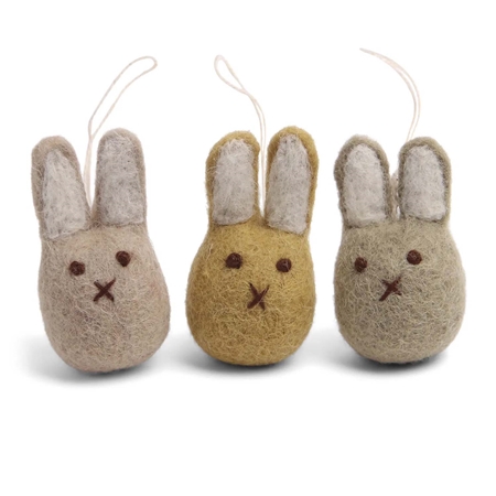 Set of felt rabbits in ochre colours