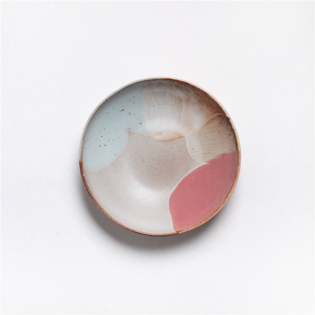 Deep plate with coloured pastel glaze