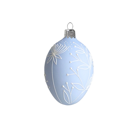 Easter egg with flower decoration in pastel blue