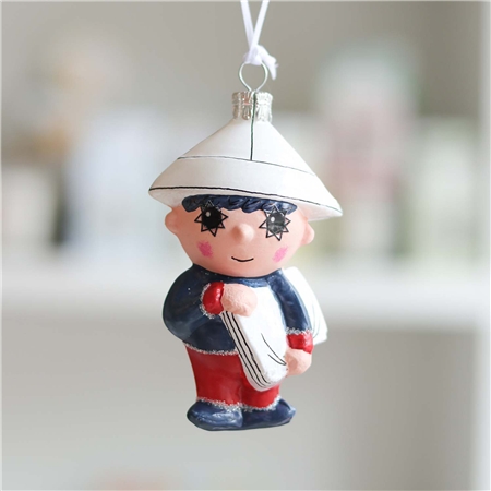 Evening Star figurine with newspaper