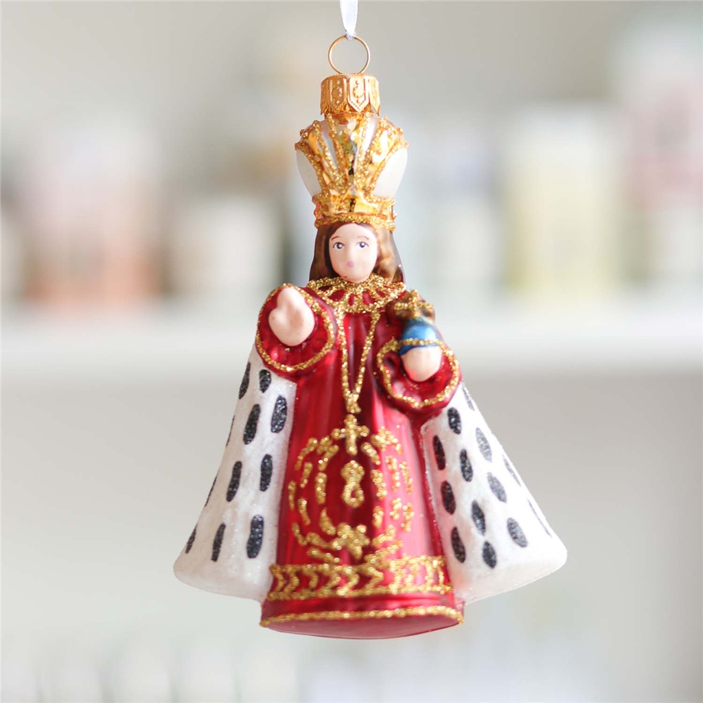 Baby Jesus in red robe with fur