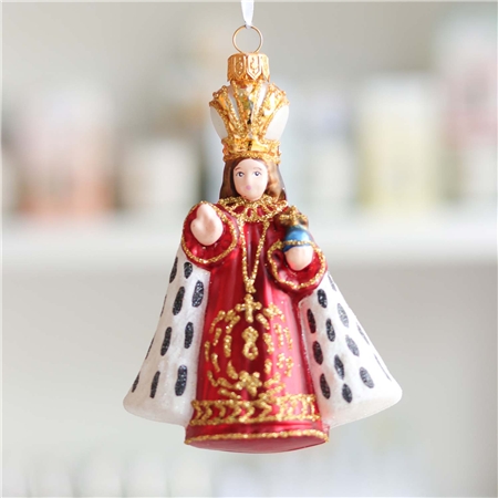 Baby Jesus in red robe with fur