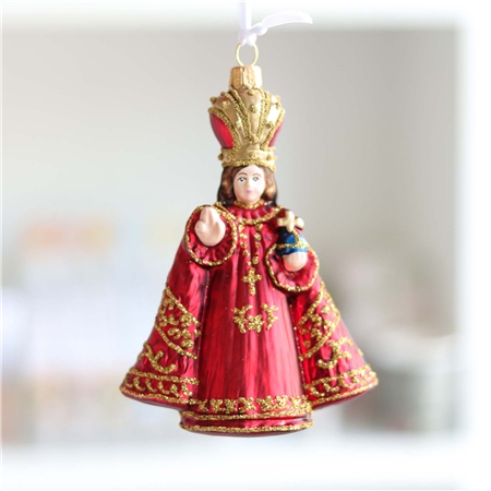 Baby Jesus in a red robe