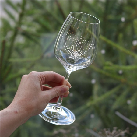 Hand-painted wine glass with a flower
