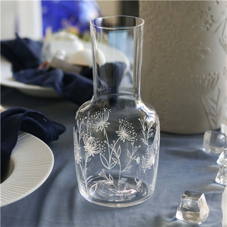 Hand-painted carafe with a flower