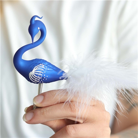 A swan the color of night with a crest