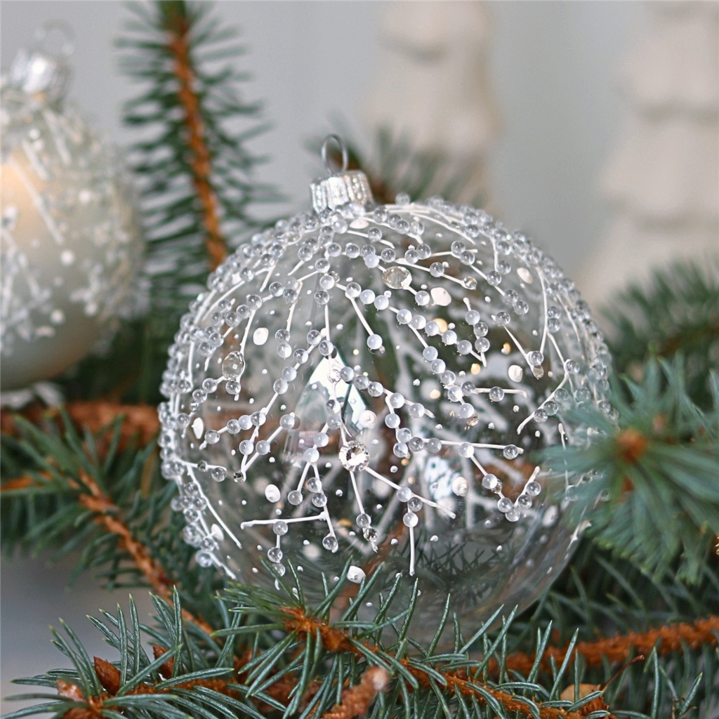 Tranparent glass bauble with frozen raindrops décor
