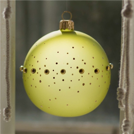 Glass ornament in matte green color with gold pearls and polka dots decor